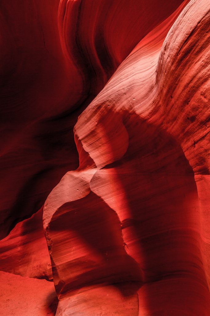 The bright red walls of Canyon X show prominently in this famous Slot Canyon near Page, Arizona
