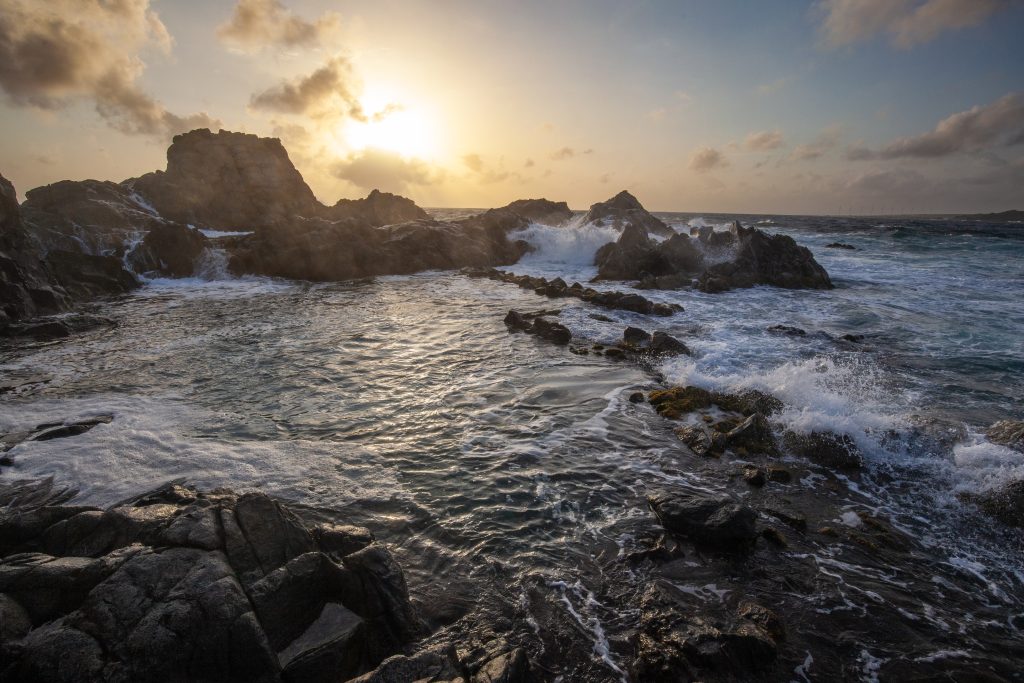 Arikok Natural Tide pool at sunrise on the East coast of Aruba