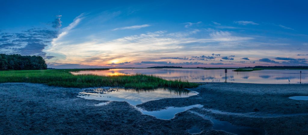 This is a panorama image of a salt marsh at sunrise in South Carolina